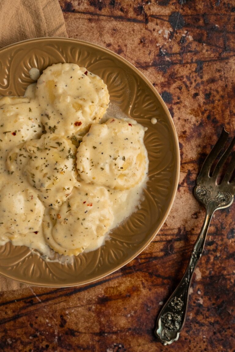 Pistachio Burrata Ravioli with White Wine Cream Sauce