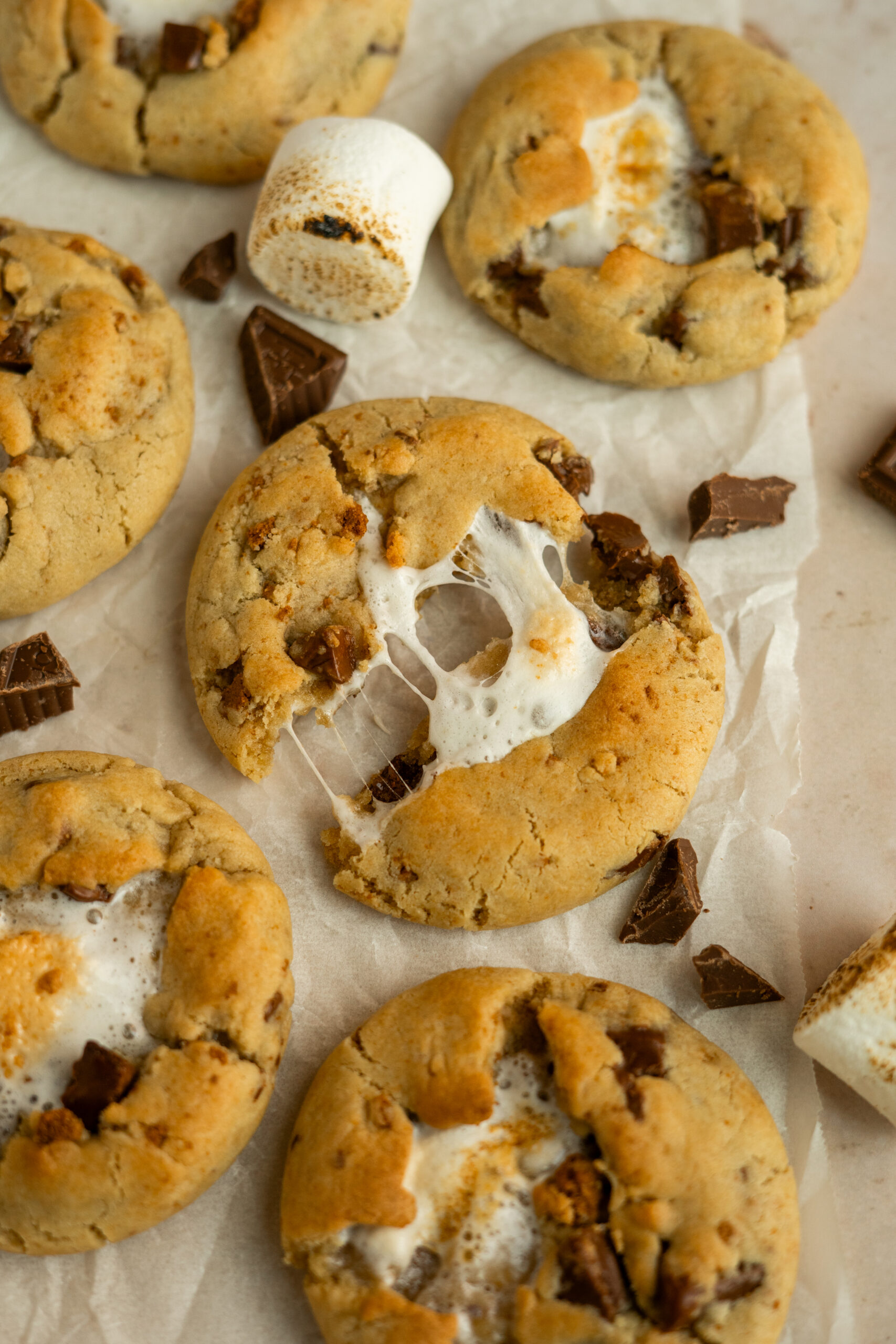 s'mores cookie pulled apart to show marshmallow filling.