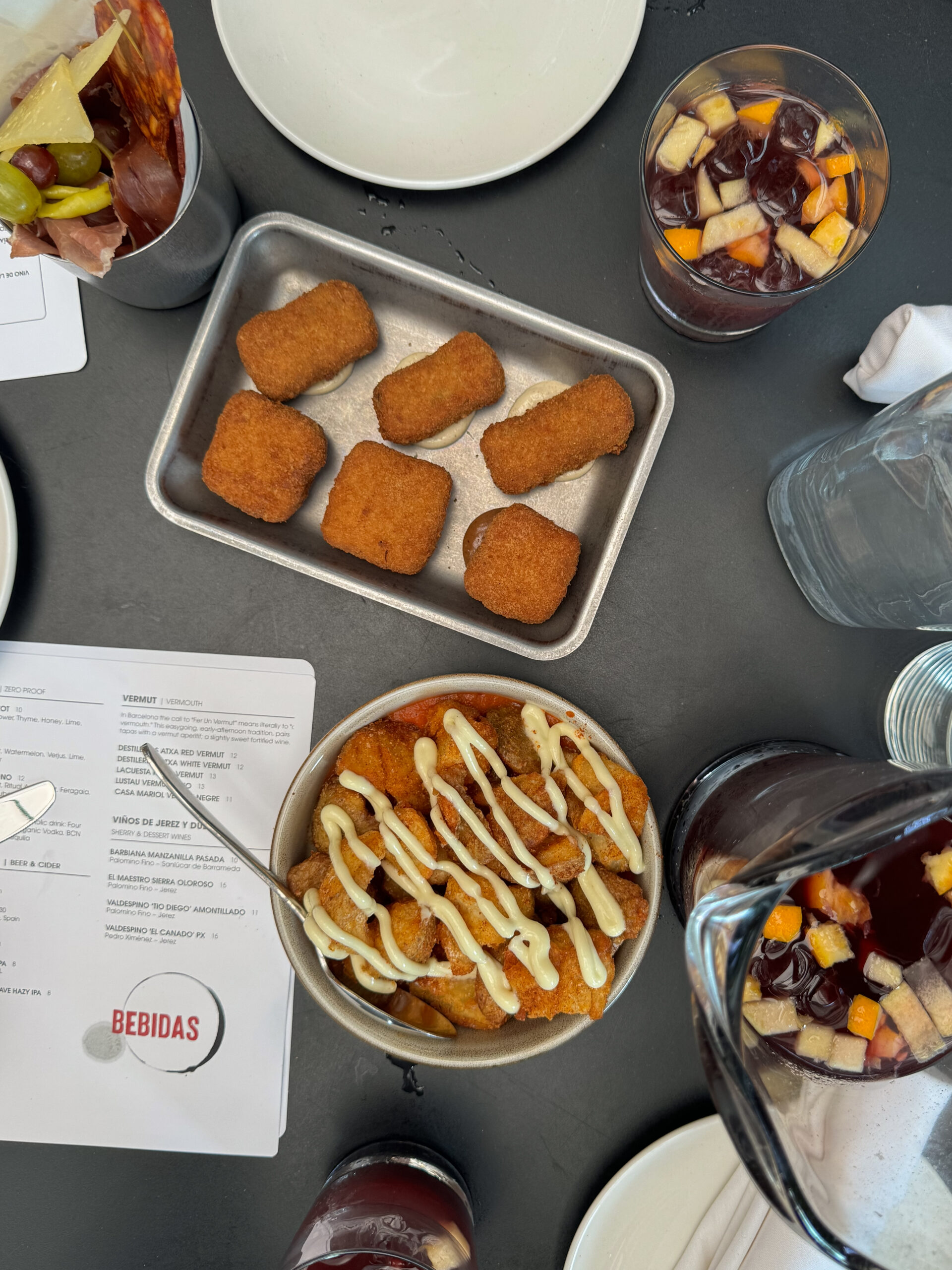 overhead view of tapas on dining table.