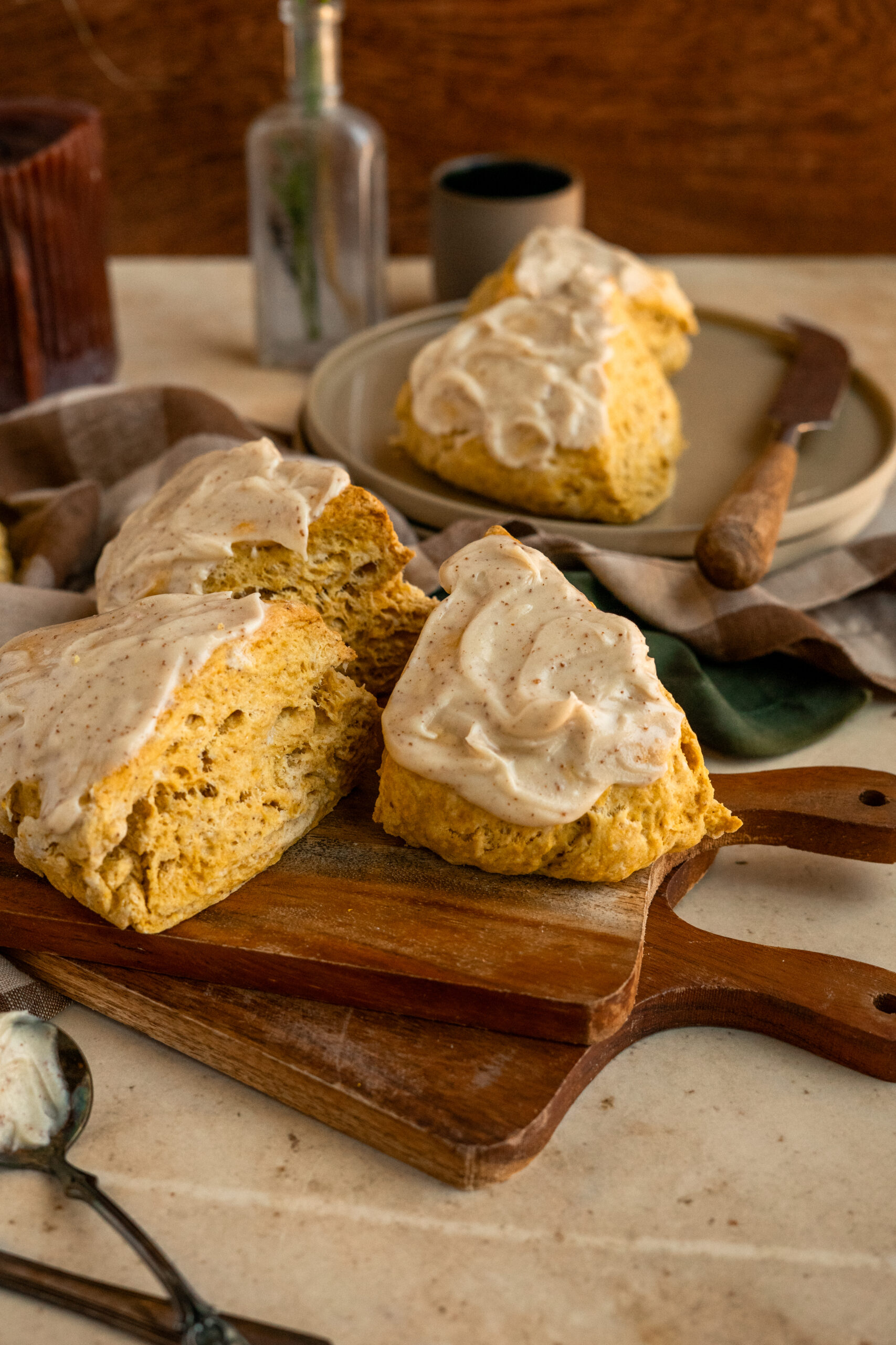 close up shot of pumpkin scones on a wooden board.