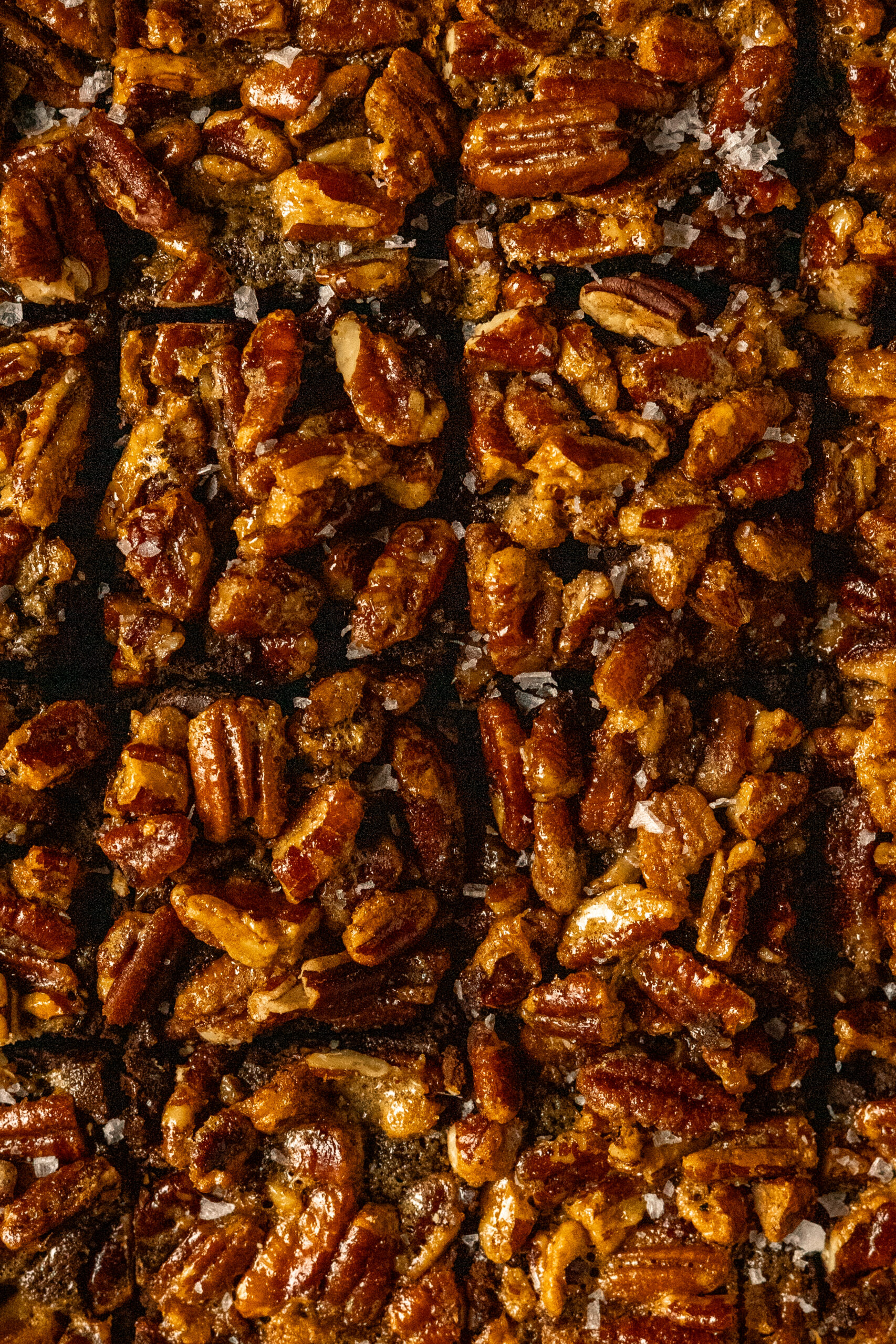 close up of sliced pecan pie brownies.