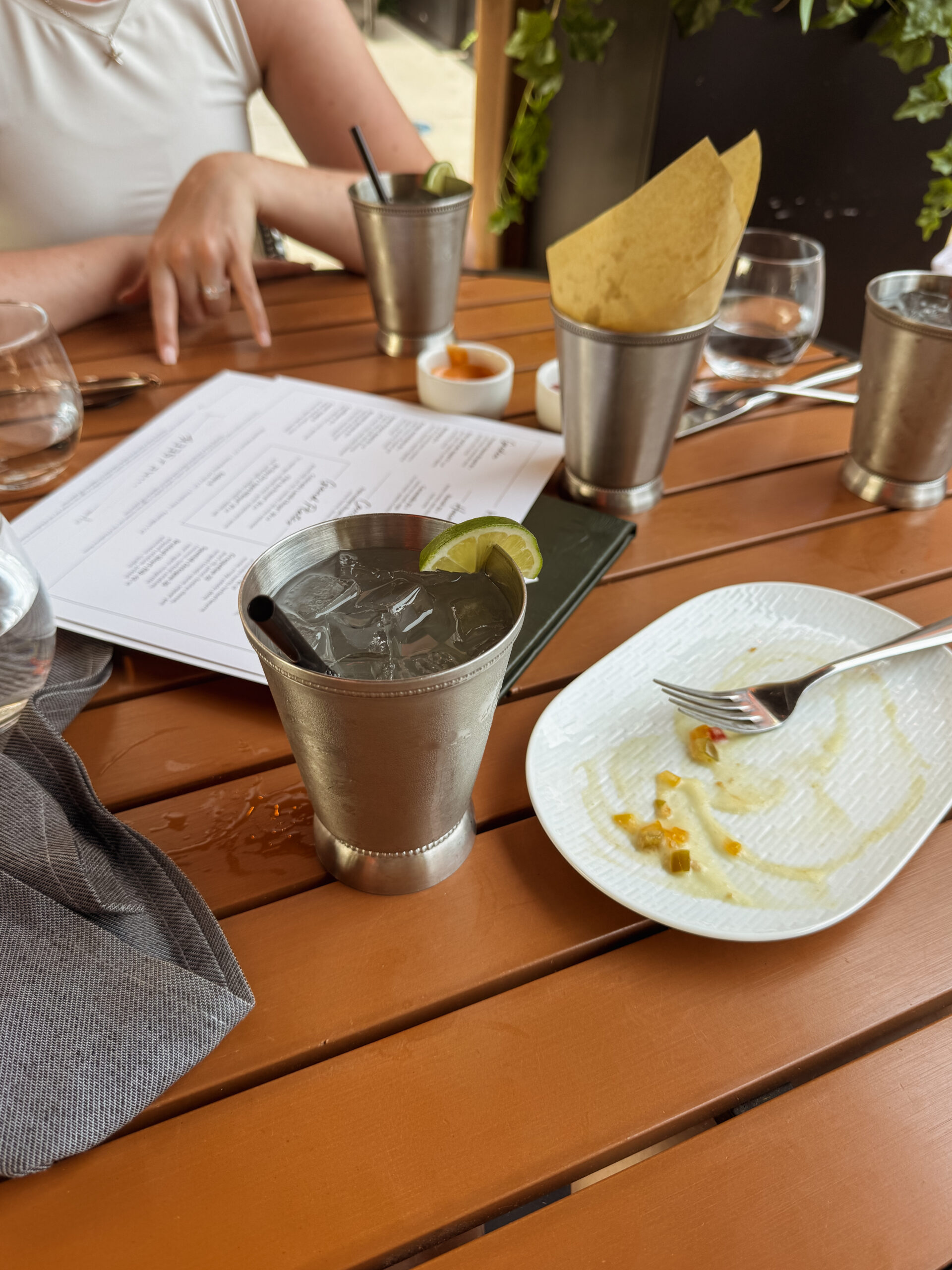 mule cups and French fries on table.