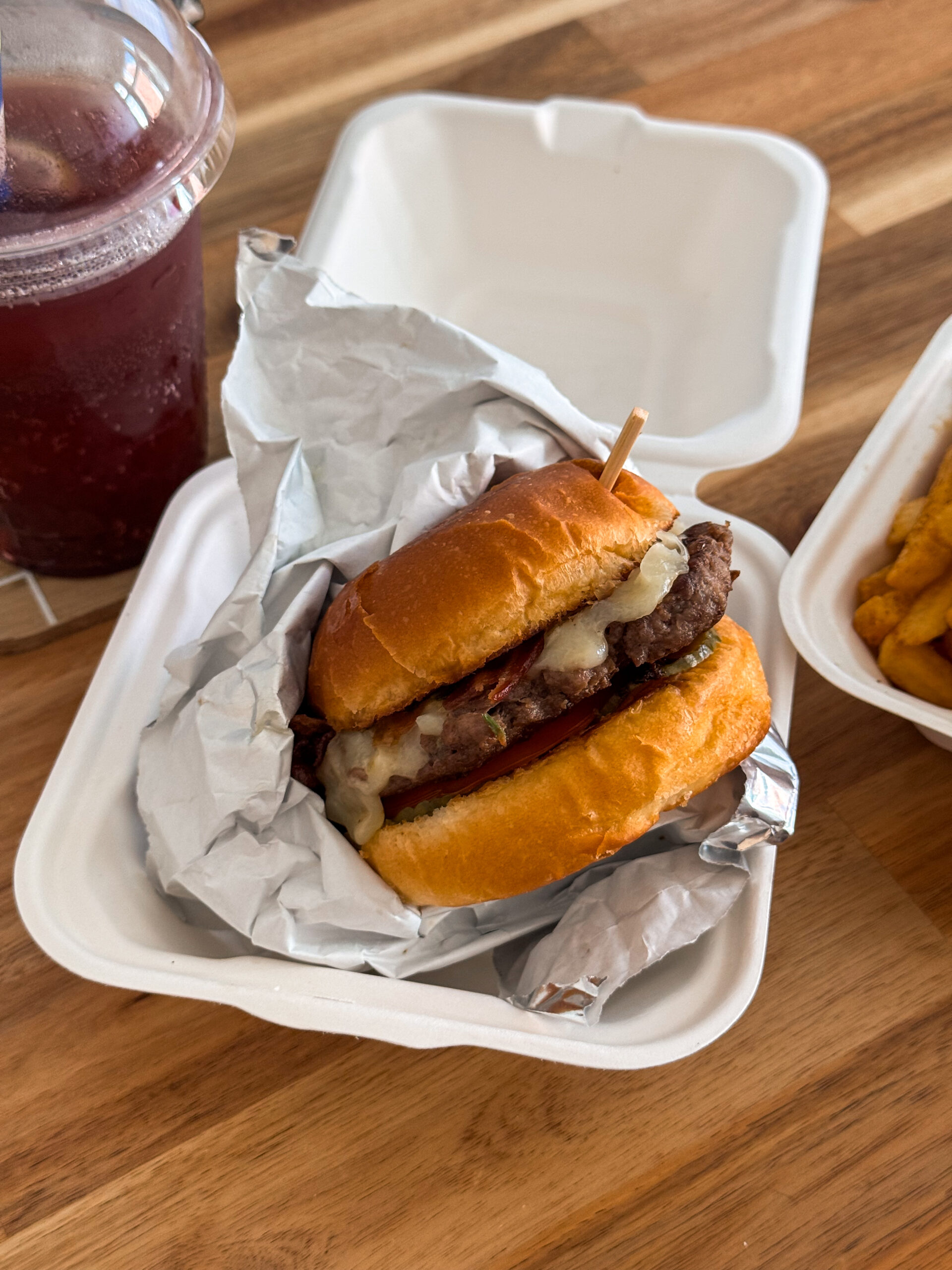 burger in takeout container.