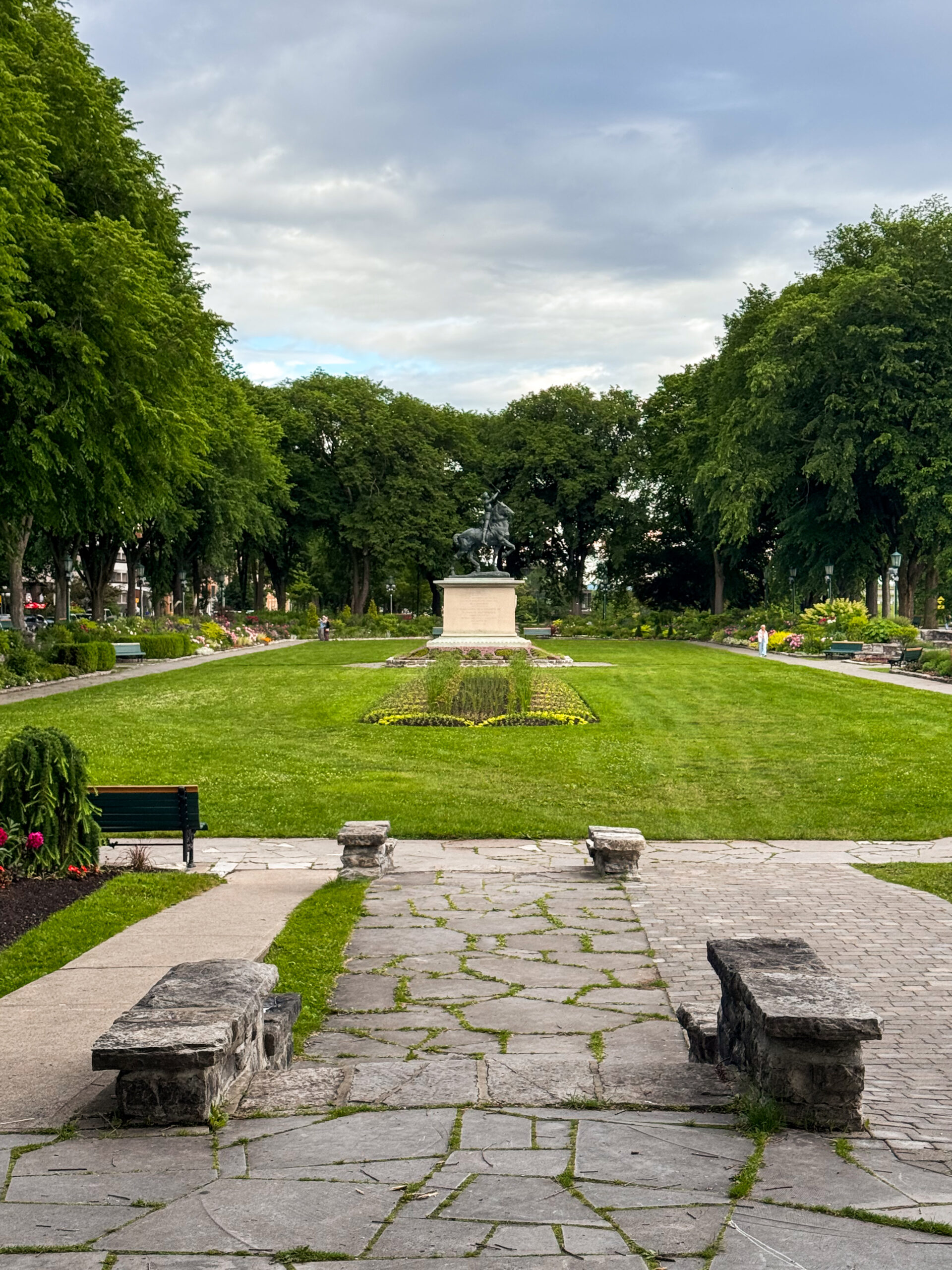 joan of arc statue in garden.